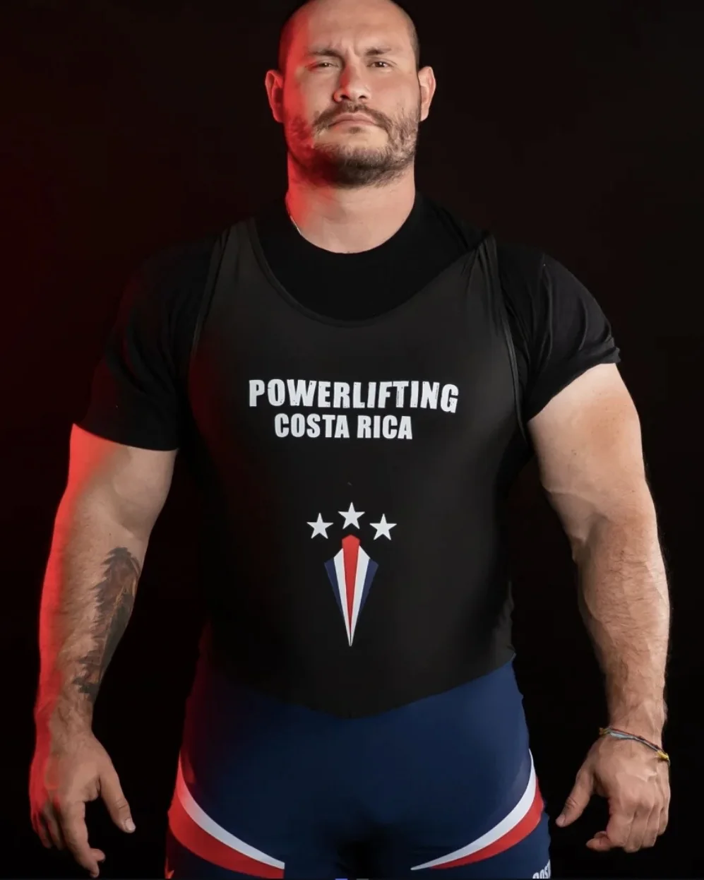 Studio portrait of Douglas Lutz wearing his Powerlifting Costa Rica singlet