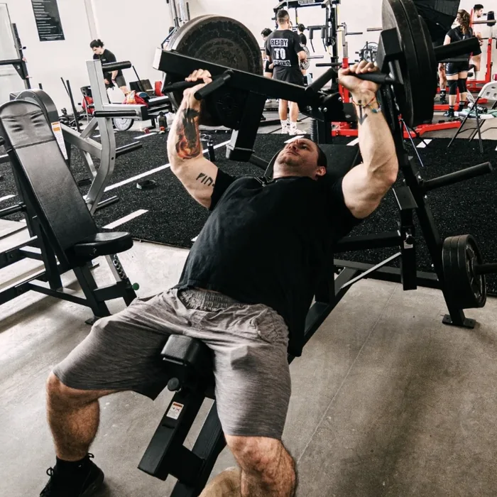 Douglas Lutz training on an incline press